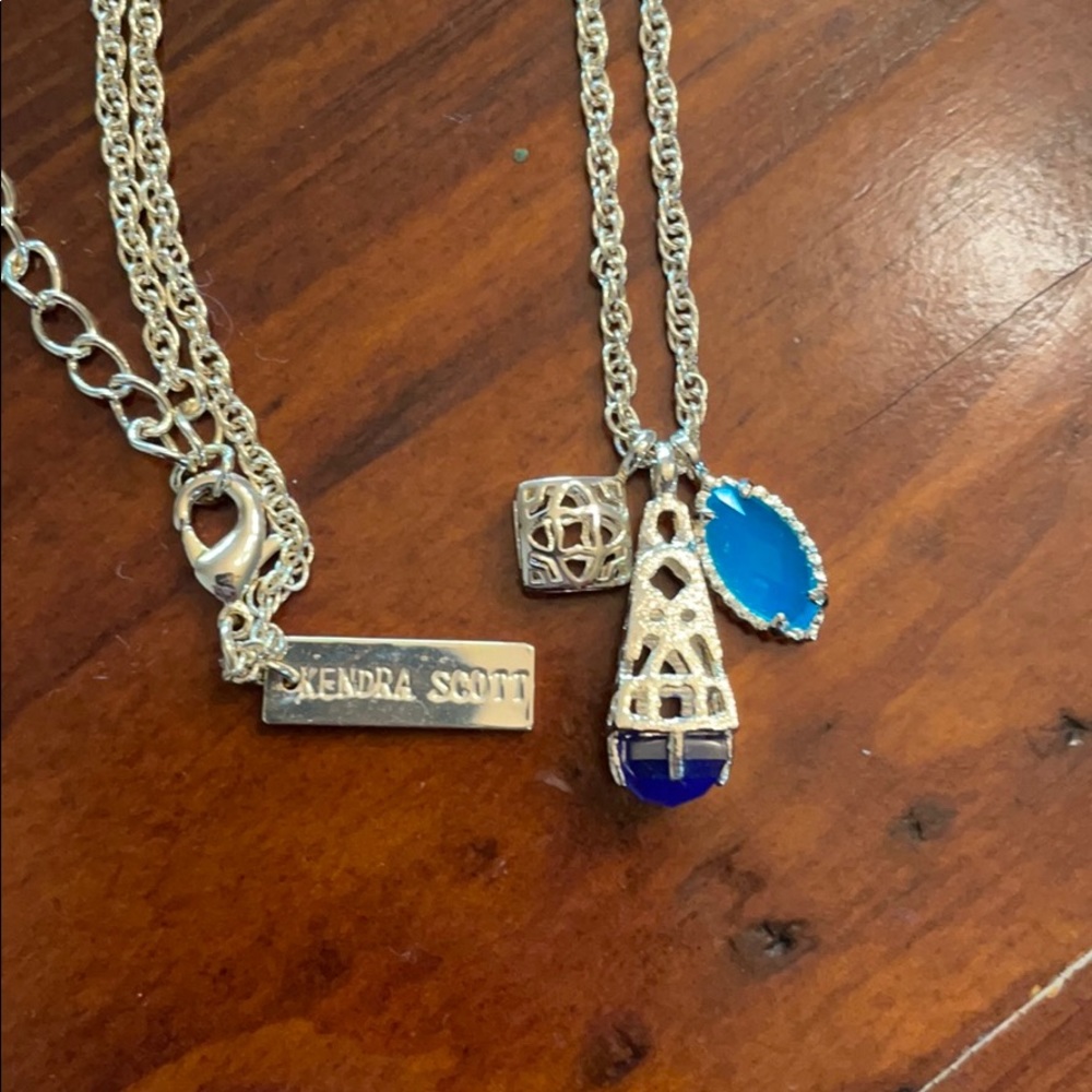 Kendra Scott necklace with blue tone pendants